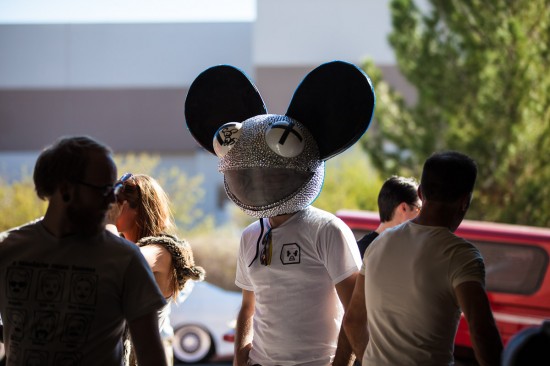 A participant with a costume head