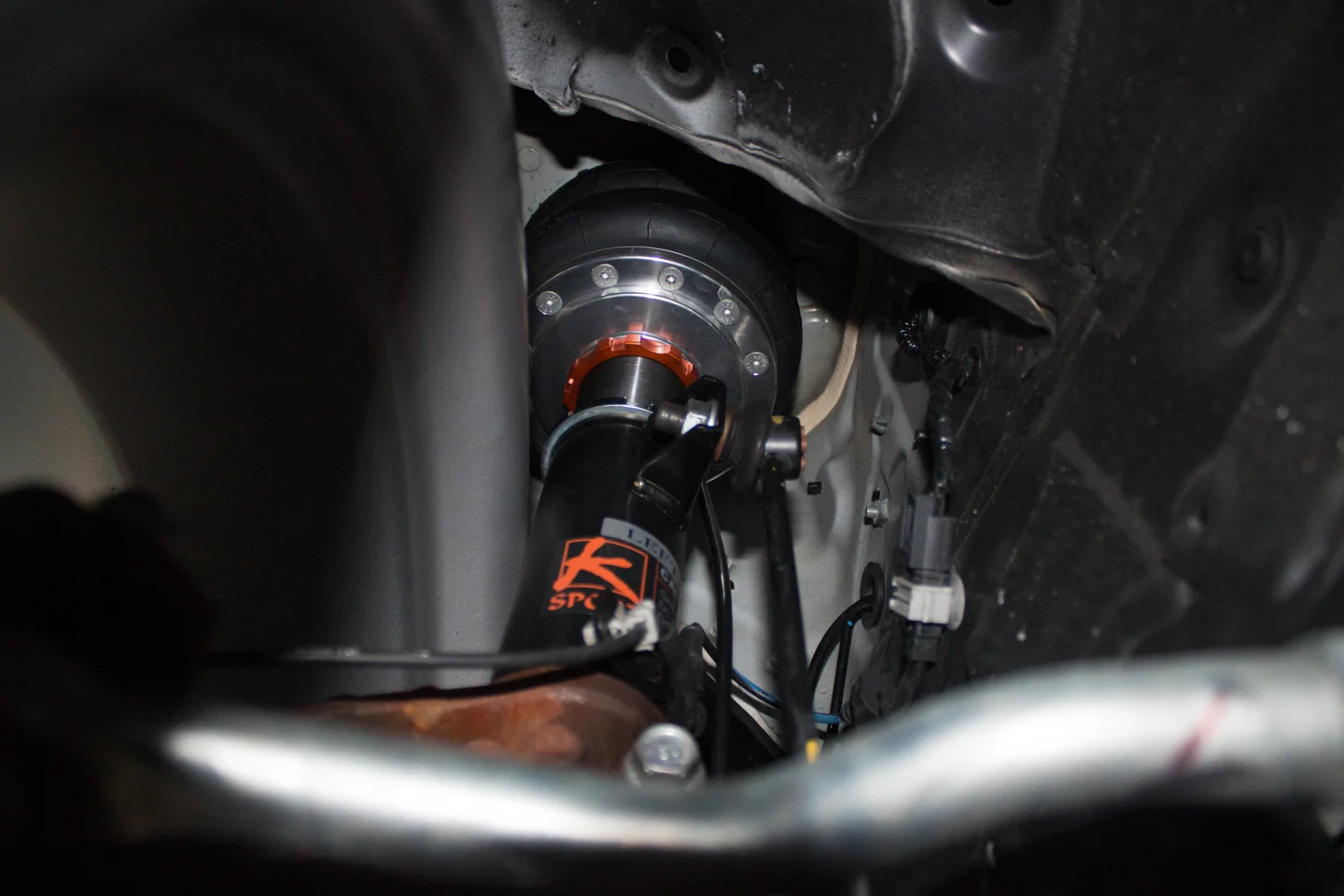 KSport Airtech strut installed in a Honda Accord wheel well